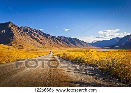 Stock Photography - Scenic view of the Dalton Highway, Brooks Range, and Trans-Alaska Pipeline, Arctic Alaska. Fotosearch