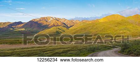 Scenic view of the park road and Stony Dome wining down Highway Pass at sunset, Denali National Park, Interior Alaska View Large Photo Image Picture - Scenic view of the park road and Stony Dome wining down Highway Pass at sunset, Denali National Park, Interior Alaska. Fotosearch