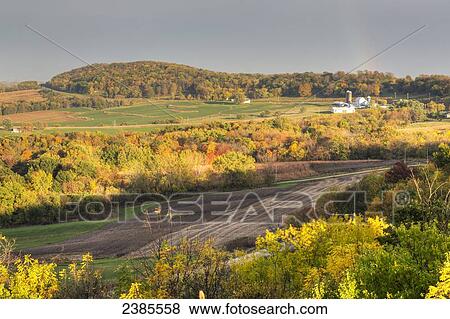 Stock Photo - Scenic view of the rolling farmland and autumn foliage along The Great River Road near Balltown; Iowa, United States of America. Fotosearch