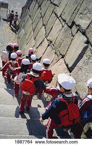 School Children ( 6-7 Years) Walking Down Stone Stairs, Rear View, Elevated View View Large Photo Image Picture - School Children ( 6-7 Years) Walking Down Stone Stairs, Rear View, Elevated View. Fotosearch