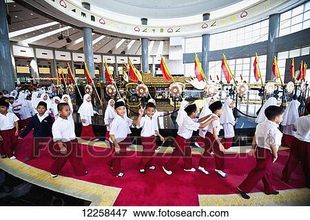 Stock Photo - School children in the Royal Regalia Museum; Bandar Seri Begawan, Brunei. Fotosearch