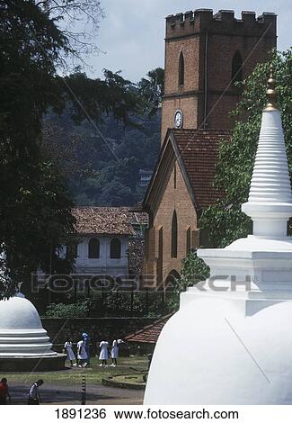Stock Photograph - Schoolgirls In Temple Of The Tooth. Fotosearch