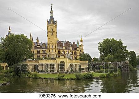 Stock Photography - Schwerin Castle Along The Water; Schwerin, Mecklenburg, Germany. Fotosearch