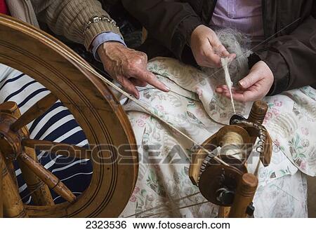Stock Photograph - Scotland, Highlands, Applecross Peninsula, Learning to weave on loom. Fotosearch