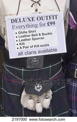 Stock Image - Scotland, tartan tat; Edinburgh, sporran, Full highland outfit for sale including kilt. Fotosearch