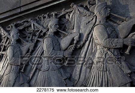 Stock Photography - Scottish pipers on the war memorial in Princes Street Gardens; Edinburgh, Scotland. Fotosearch