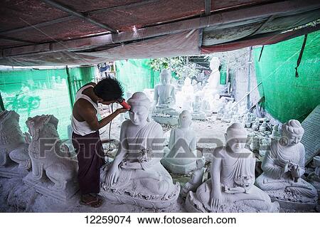Picture - Sculpting religious statues; Mandalay, Myanmar. Fotosearch
