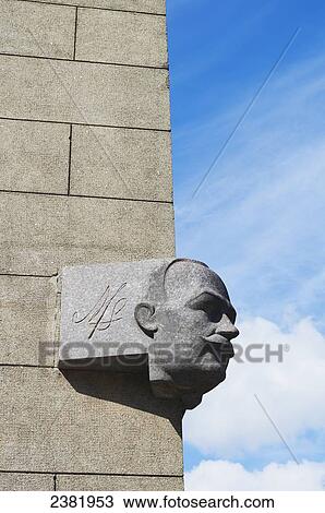 Stock Image - Sculptural bust on side of building; Vilnius, Lithuania. Fotosearch