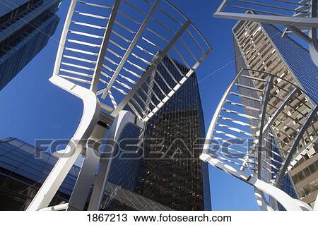 Stock Image - Sculpture And Buildings, Calgary, Alberta, Canada. Fotosearch