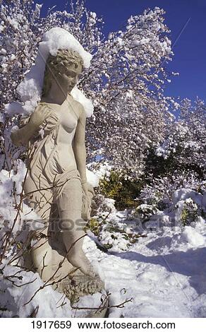 Stock Photo - Sculpture Covered In Snow. Fotosearch