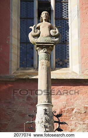 Sculpture Of A Figure That Is Half Human Half Animal; Rothenburg Ob Der Tauber Bavaria Germany View Large Photo Image Picture - Sculpture Of A Figure That Is Half Human Half Animal; Rothenburg Ob Der Tauber Bavaria Germany. Fotosearch