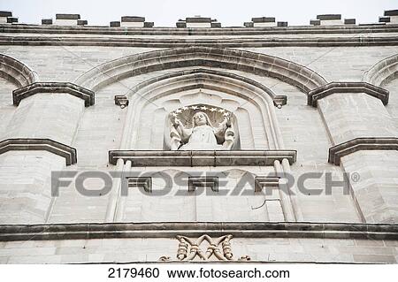 Sculpture Of A Human Figure On The Wall Of A Building; Montreal Quebec Canada View Large Photo Image Stock Image - Sculpture Of A Human Figure On The Wall Of A Building; Montreal Quebec Canada. Fotosearch
