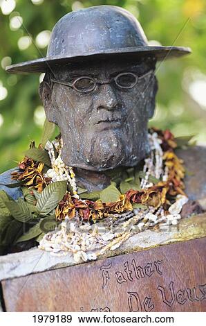 Sculpture of a man's head decorated with beaded jewelry and leaf wreaths View Large Photo Image Stock Photo - Sculpture of a man's head decorated with beaded jewelry and leaf wreaths. Fotosearch