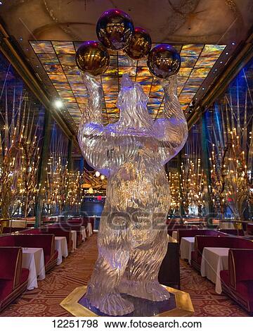 Sculpture of a polar bear inside a restaurant with a view of the city; New York City, New York, United States of America View Large Photo Image Stock Photo - Sculpture of a polar bear inside a restaurant with a view of the city; New York City, New York, United States of America. Fotosearch