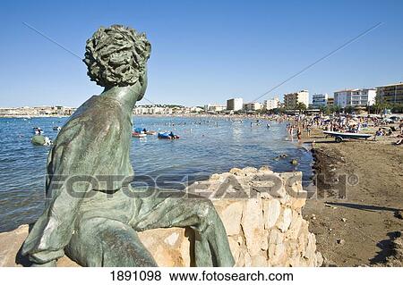Sculpture Of Child At L'escala Beach View Large Photo Image Stock Photo - Sculpture Of Child At L'escala Beach. Fotosearch