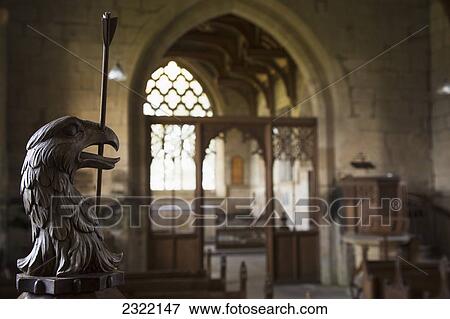 Sculpture of eagle with sceptre in it's mouth; Yetholm, Scottish Borders, Scotland, UK View Large Photo Image Stock Photo - Sculpture of eagle with sceptre in it's mouth; Yetholm, Scottish Borders, Scotland, UK. Fotosearch