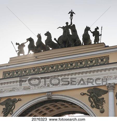 Stock Image - Sculptures On Top Of The General Staff Building; St. Petersburg Russia. Fotosearch