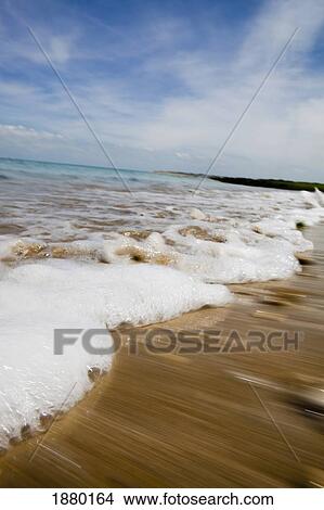 Picture - Sea Washing In Onto Sandy Beach. Fotosearch