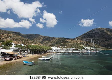 Seafront tavernas in the harbour; Vathi, Sifnos, Cyclades, Greek Islands, Greece View Large Photo Image Stock Photography - Seafront tavernas in the harbour; Vathi, Sifnos, Cyclades, Greek Islands, Greece. Fotosearch
