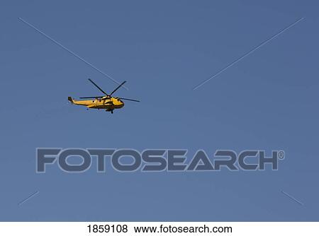Stock Photo - Search And Rescue Helicopter, Boulmer, Northumberland, England. Fotosearch