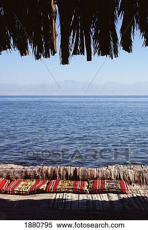 Stock Photography - Seating Along The Red Sea. Fotosearch