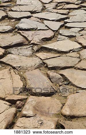 Stock Image - Section Of Roman Road Beside The Roman Theatre; Meria, Badajoz Province, Spain. Fotosearch