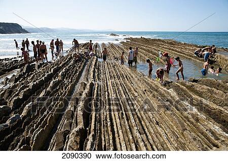 Sedimentary Rocks Known As Flysch In Itzurun Beach, Zumaia, Basque Country, Spain View Large Photo Image Stock Image - Sedimentary Rocks Known As Flysch In Itzurun Beach, Zumaia, Basque Country, Spain. Fotosearch