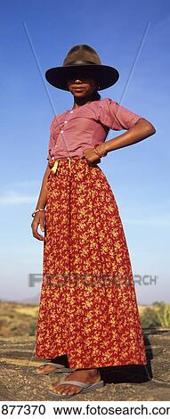 Stock Image - Seengh Sagar, Rajasthani, India; A Girl Wearing A Hat At Forg Seengh Sagar Hotel. Fotosearch