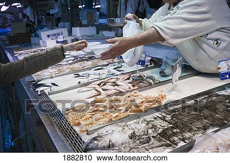 Selling Food At A Market; Valencia, Spain View Large Photo Image Stock Image - Selling Food At A Market; Valencia, Spain. Fotosearch