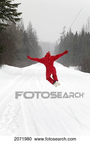 Senior Woman Leaping For Joy In The Snow, Algonquin Park, Ontario View Large Photo Image Stock Image - Senior Woman Leaping For Joy In The Snow, Algonquin Park, Ontario. Fotosearch