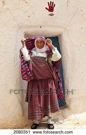 Senior Woman Lives In An Underground Cave House In The Tataouine Province; Matmata, Tunisia, North Africa View Large Photo Image Stock Image - Senior Woman Lives In An Underground Cave House In The Tataouine Province; Matmata, Tunisia, North Africa. Fotosearch