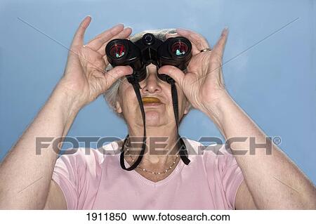 Senior Woman Looking Through Binoculars View Large Photo Image Stock Image - Senior Woman Looking Through Binoculars. Fotosearch