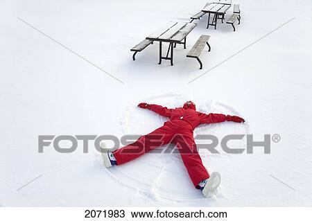 Senior Woman Making A Snow Angel, Algonquin Park, Ontario View Large Photo Image Stock Image - Senior Woman Making A Snow Angel, Algonquin Park, Ontario. Fotosearch