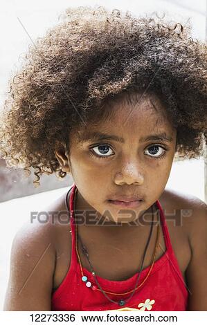 Sentani girl, Pulao Asei, island in Lake Sentani, Papua, Indonesia View Large Photo Image Stock Photograph - Sentani girl, Pulao Asei, island in Lake Sentani, Papua, Indonesia. Fotosearch
