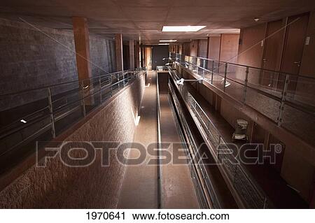 Stock Image - Series Of Ramps And Balconies Provide Access To The Individual Rooms In The Paranal Residencia At The European Southern Observatory, Antofagasta Region, Chile. Fotosearch