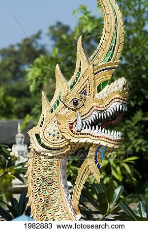 Serpent (Naga) at temple entrance; Mae Sariang, Thailand View Large Photo Image Stock Image - Serpent (Naga) at temple entrance; Mae Sariang, Thailand. Fotosearch