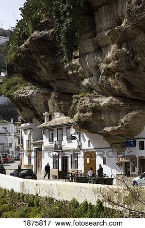 Stock Photo - Setenil De Las Bodegas, Andalusia, Spain; Buildings Under A Cliff. Fotosearch