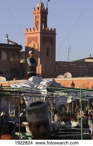 Picture - Setting Up Djemaa El Fna Food Market, Djemaa El Fna, Marrakesh, Morocco. Fotosearch