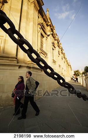 Stock Photo - Seville, Spain. People By Cathedral Gilrada. Fotosearch