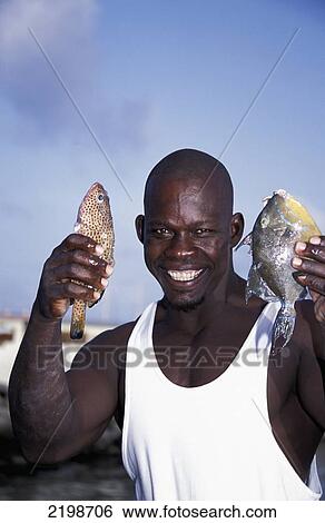 Seychelles, St Kitts, Fisherman; Bassterre View Large Photo Image Stock Photograph - Seychelles, St Kitts, Fisherman; Bassterre. Fotosearch