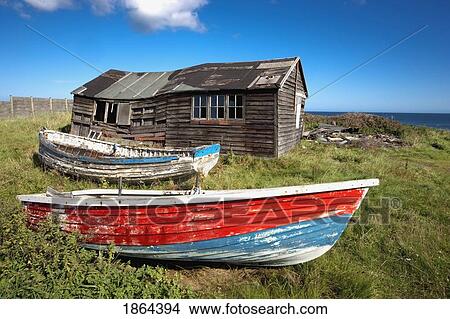 Shack And Old Boats View Large Photo Image Picture - Shack And Old Boats. Fotosearch