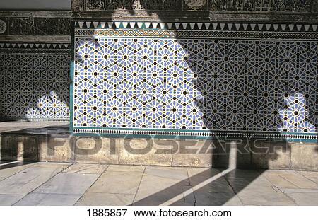 Stock Photo - Shadow Of Moorish Archway On Tiled Wall. Fotosearch