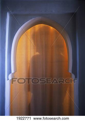 Shadow Of Woman Through Arched Doorway In The Riad Dar Zelije View Large Photo Image Stock Image - Shadow Of Woman Through Arched Doorway In The Riad Dar Zelije. Fotosearch