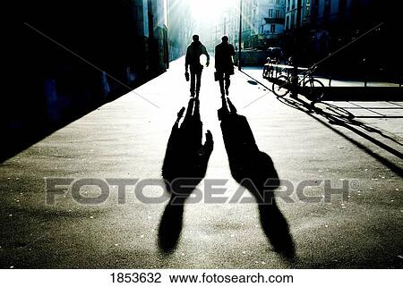 Shadows And Silhouettes Of Two People Walking Down Street; Brazil View Large Photo Image Stock Image - Shadows And Silhouettes Of Two People Walking Down Street; Brazil. Fotosearch