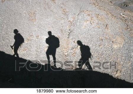 Shadows Of Hikers Ascending Hill View Large Photo Image Stock Image - Shadows Of Hikers Ascending Hill. Fotosearch