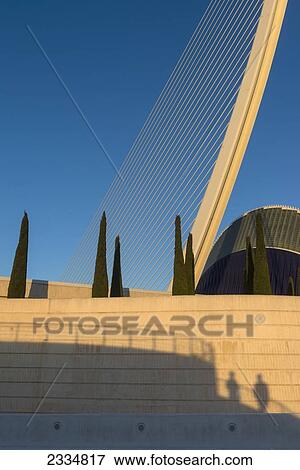 Shadows Of Two People In Front Of El Pont De L'assut De L'or And L'agora In Ciudad De Las Artes Y Las Ciencias (City Of Arts And Sciences); Valencia, Spain View Large Photo Image Stock Photo - Shadows Of Two People In Front Of El Pont De L'assut De L'or And L'agora In Ciudad De Las Artes Y Las Ciencias (City Of Arts And Sciences); Valencia, Spain. Fotosearch