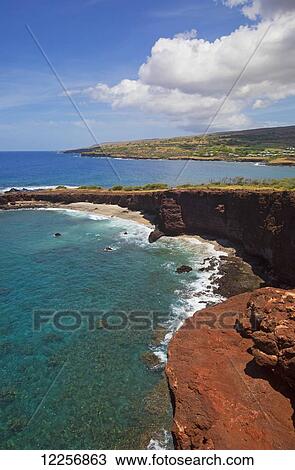 Stock Image - Shark's Cove with Four Seasons Lanai at Manele Bay in background; Lanai, Hawaii, United States of America. Fotosearch