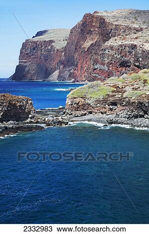 Stock Image - Shark's Fin Rock and Southern coastline; Lanai, Hawaii, United States of America. Fotosearch
