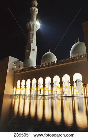 Stock Image - Sheikh Zayed Grand Mosque at night; Abu Dhabi, United Arab Emirates. Fotosearch