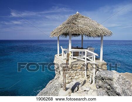 Stock Photo - Shelter On The Cliffs, Negril, Parish Of Westmorland, Jamaica.. Fotosearch